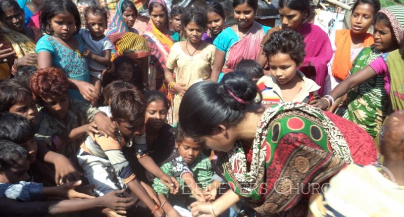Slum Children and Beggars in Diocese of Jasidih Receive Food Packets on World Food Day