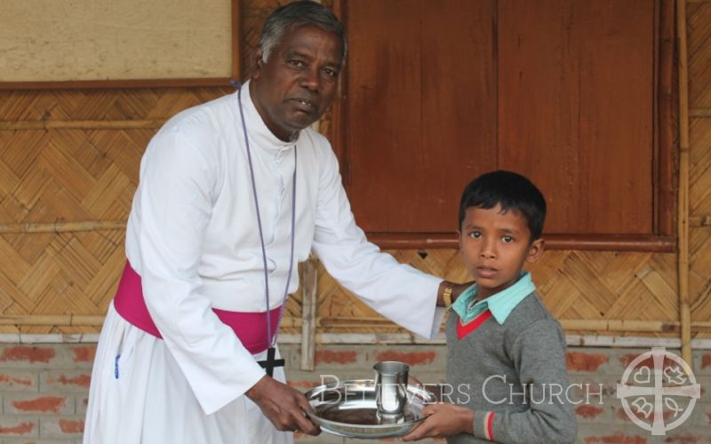 Bishop B. Sunderraj Distributes School Uniforms to Children in Diocese of Jorhat